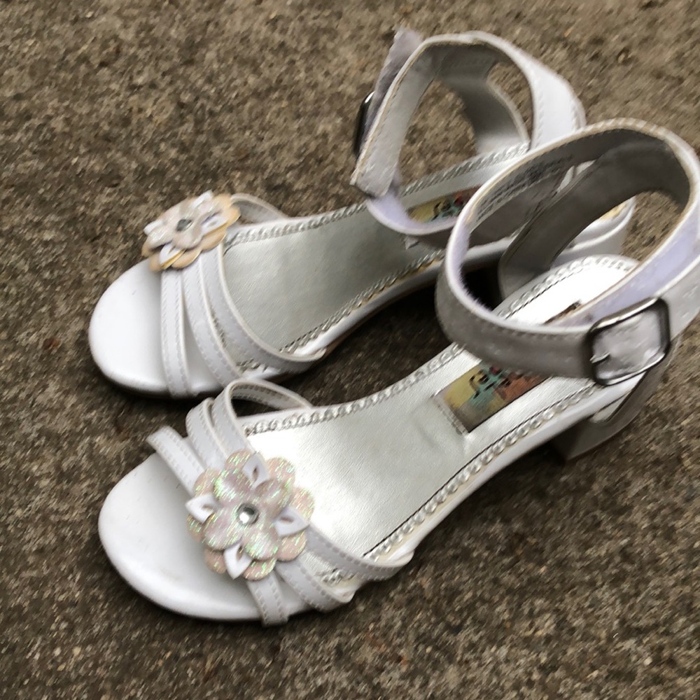 Selling white sandals